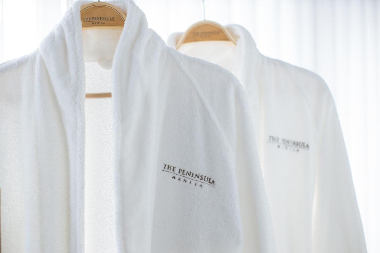 The Peninsula Manila Hotel Makati City Exterior photo The Peninsula Bathrobe