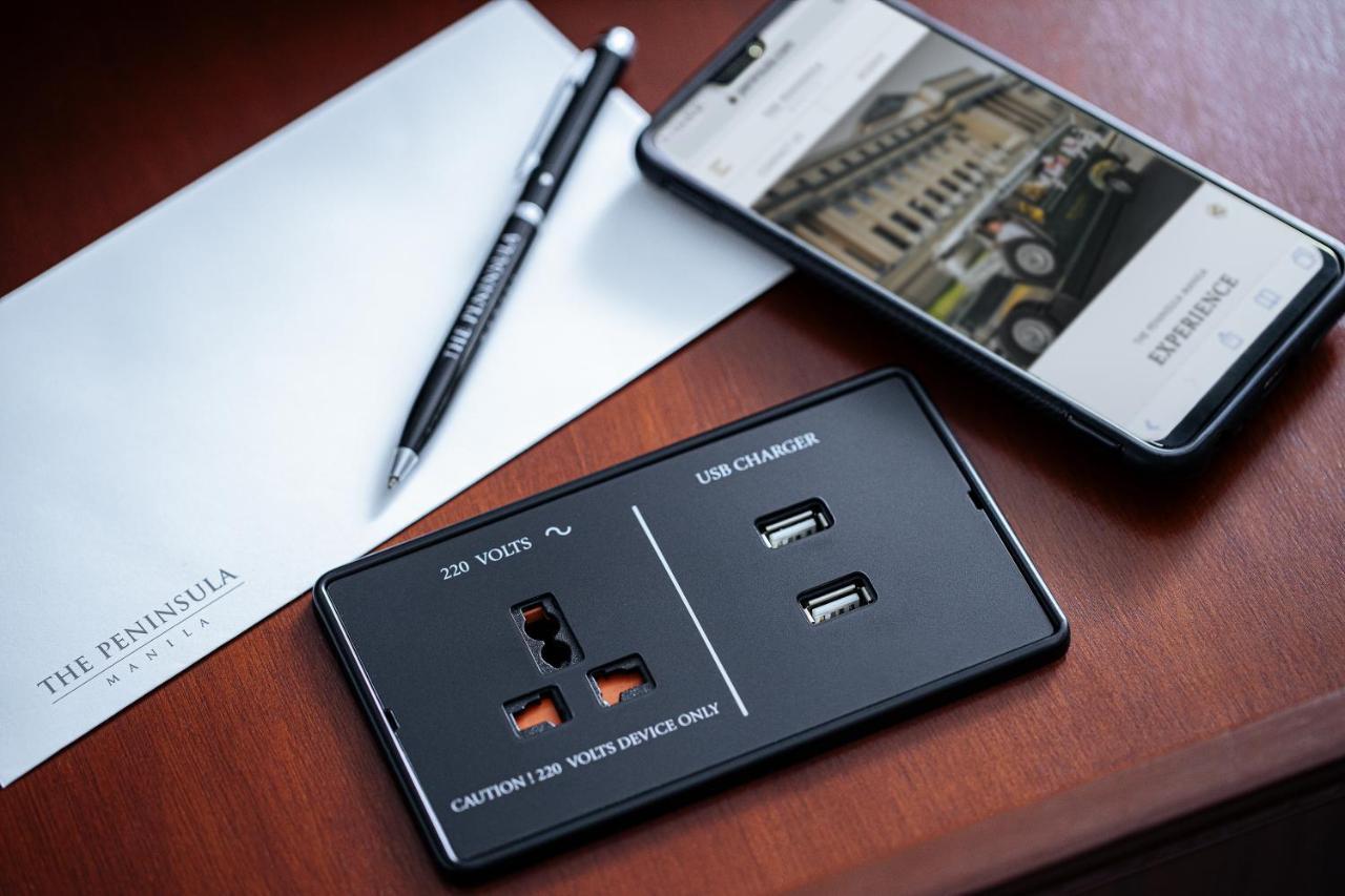 The Peninsula Manila Hotel Makati City Exterior photo A power strip with a USB charger